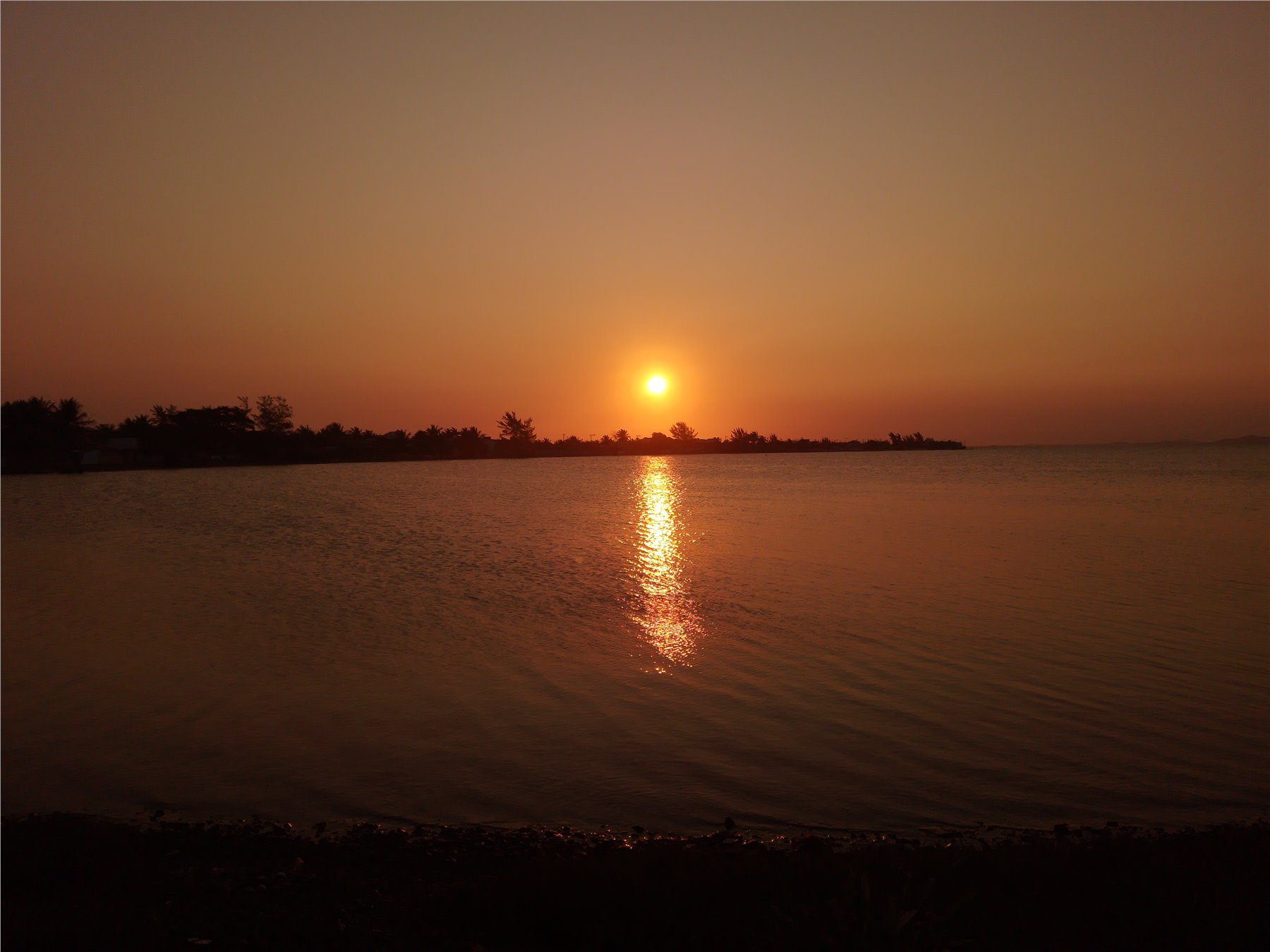 Por do sol na lagoa de Figueira